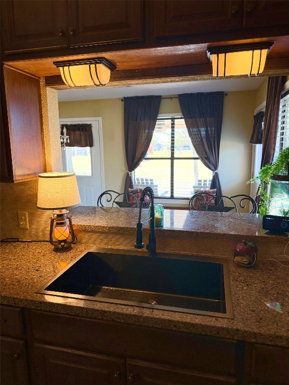 211 Rabbit Hollow Lane Georgetown, TX 78626 - Photo 17 of 34 a kitchen with a sink and a window