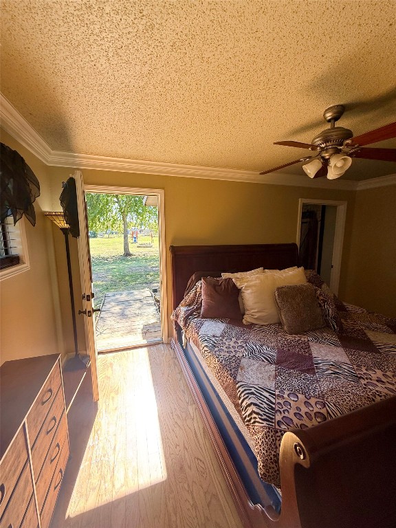 211 Rabbit Hollow Lane Georgetown, TX 78626 - Photo 26 of 34 a bed sitting in a bedroom next to a window