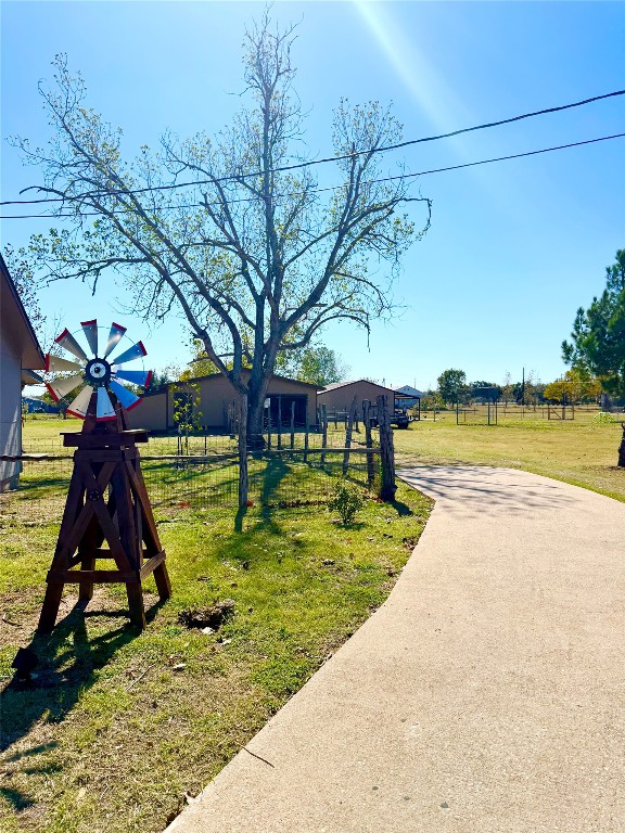 211 Rabbit Hollow Lane Georgetown, TX 78626 - Photo 30 of 32 Huge workshop, features ac unit, fans, epoxy flooring and electric