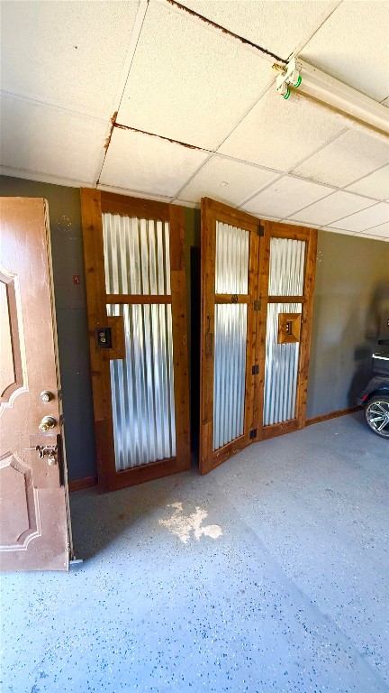 211 Rabbit Hollow Lane Georgetown, TX 78626 - Photo 9 of 34 behind the custom doors is a tool area and a drive in smaller area for lawn equipment