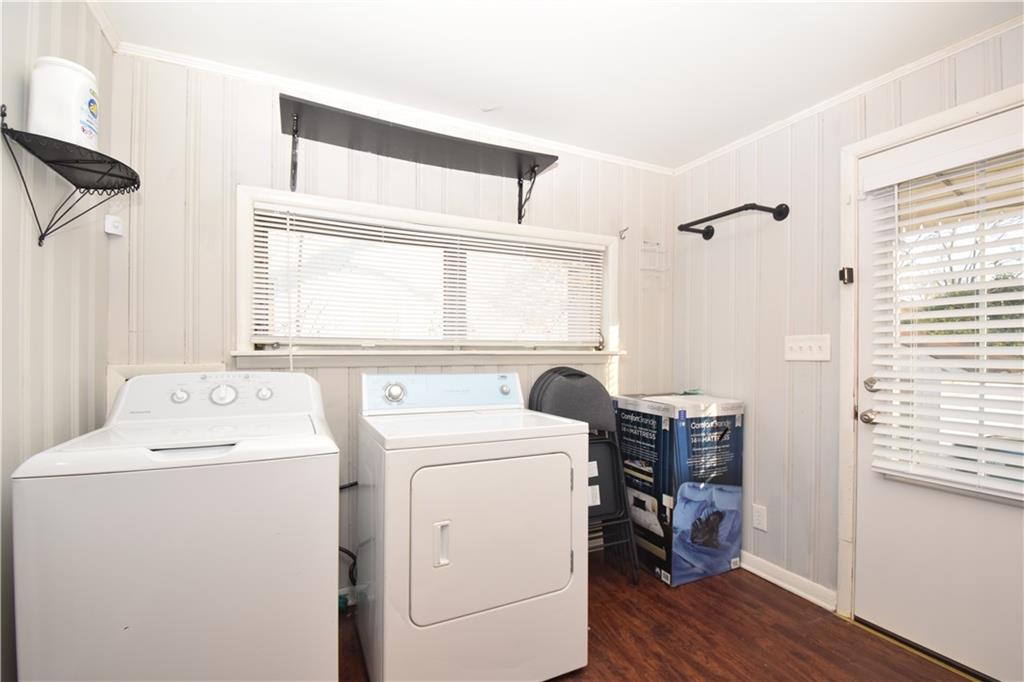 3116 Jackson Street Atlanta, GA 30354 - Photo 11 of 21 a view of washer and dryer with wooden floor