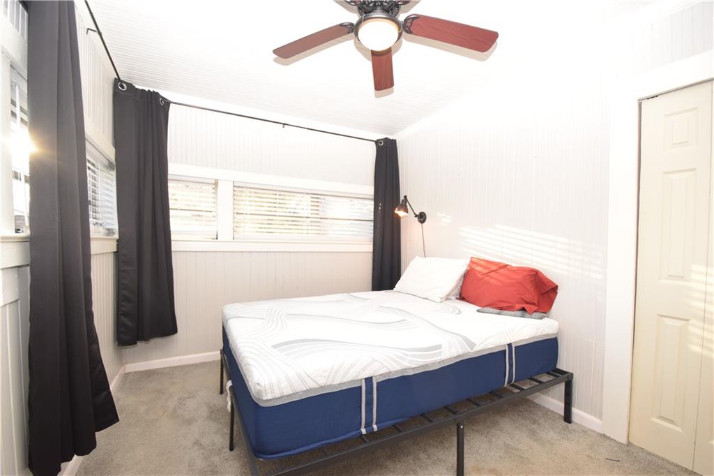 3116 Jackson Street Atlanta, GA 30354 - Photo 12 of 21 a bedroom with a bed and a window