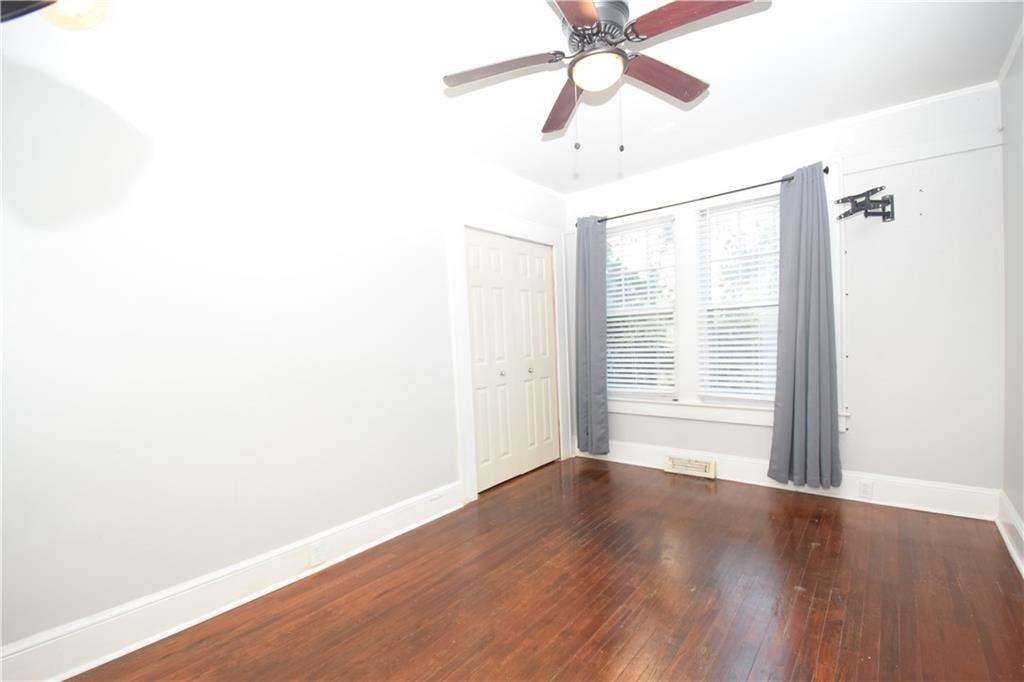 3116 Jackson Street Atlanta, GA 30354 - Photo 15 of 21 a view of an empty room with wooden floor and a window