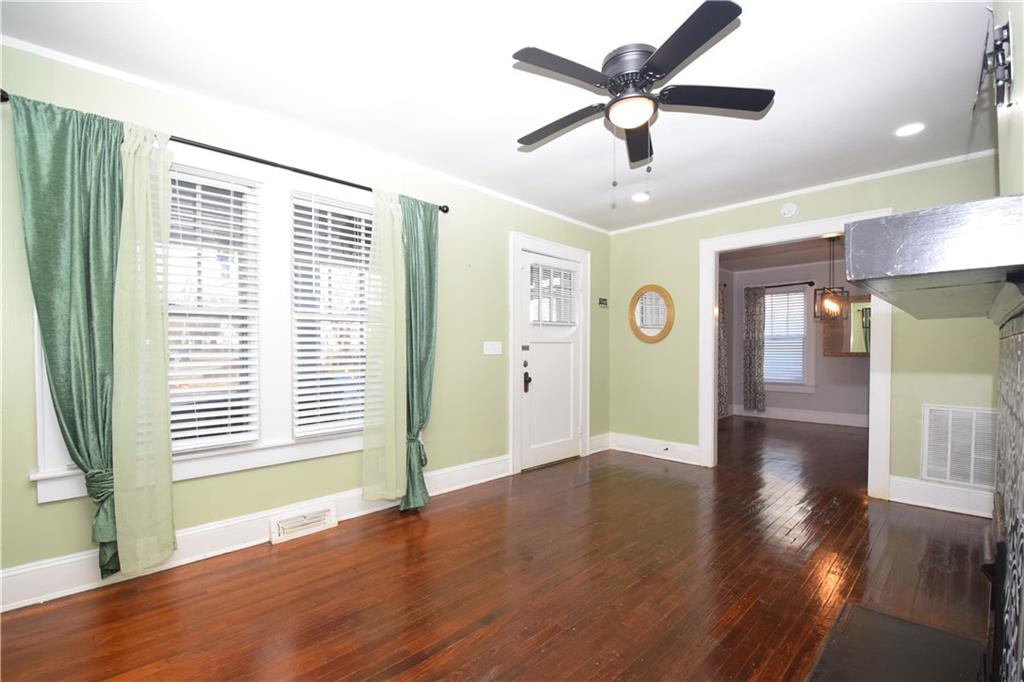 3116 Jackson Street Atlanta, GA 30354 - Photo 4 of 21 a view of an empty room with window and wooden floor