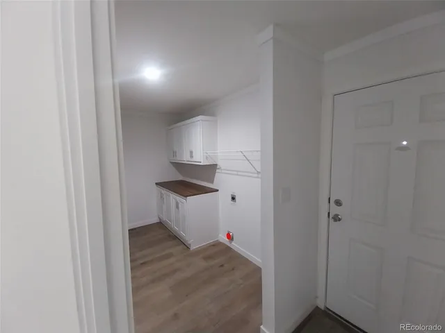 a view of kitchen and front door