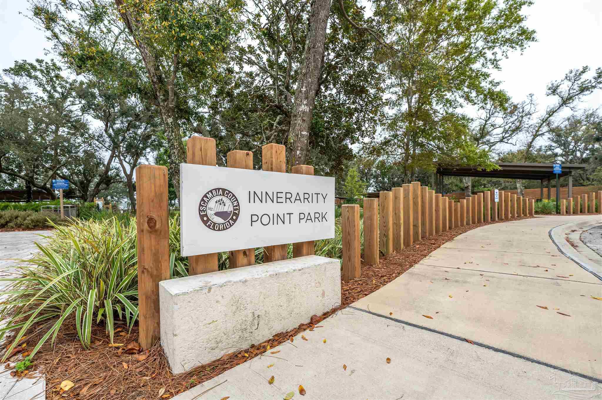 5941 Red Cedar Street Pensacola, FL 32507 - Photo 13 of 16 a view of outdoor space with sign board