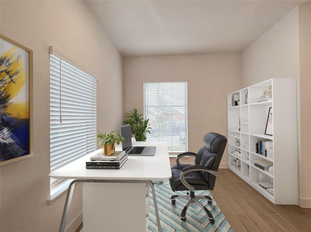 4315 Hudson Street Fate, TX 75087 - Photo 8 of 15 a view of a workspace with furniture and a potted plant