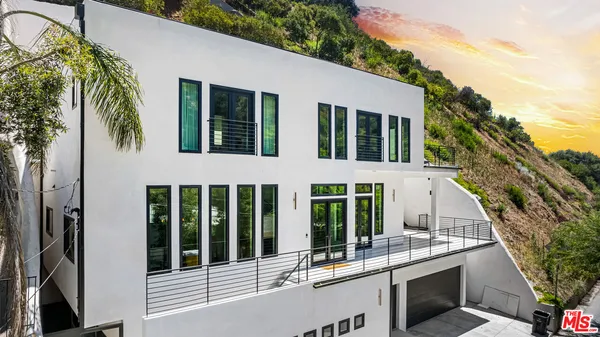 a view of a house with a balcony