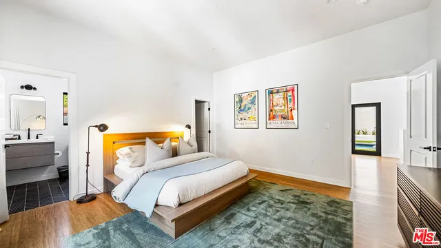 a bed room with a bed and a couch