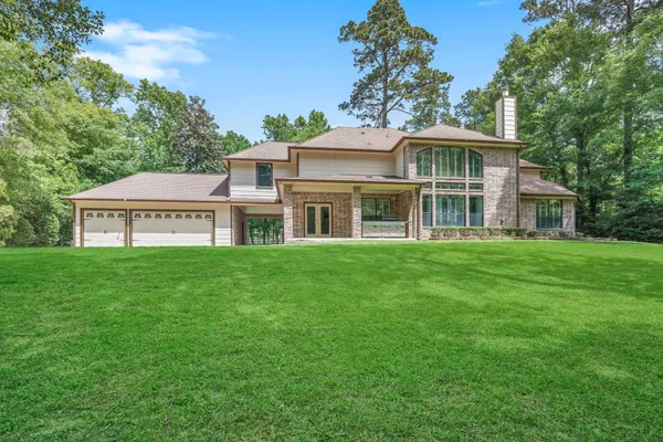 $975,000 | 10332 Hunter Creek Lane, Conroe, TX 77304