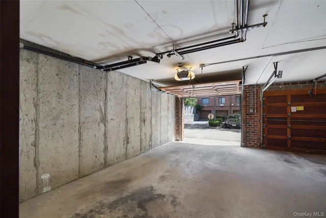 a view of empty room with wooden walls