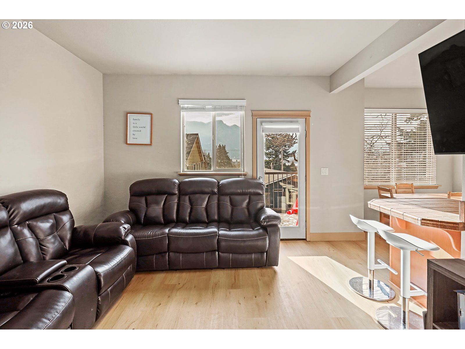 41 Lasher Street, Unit C4 Stevenson, WA 98648 - Photo 11 of 48 a living room with furniture and a flat screen tv