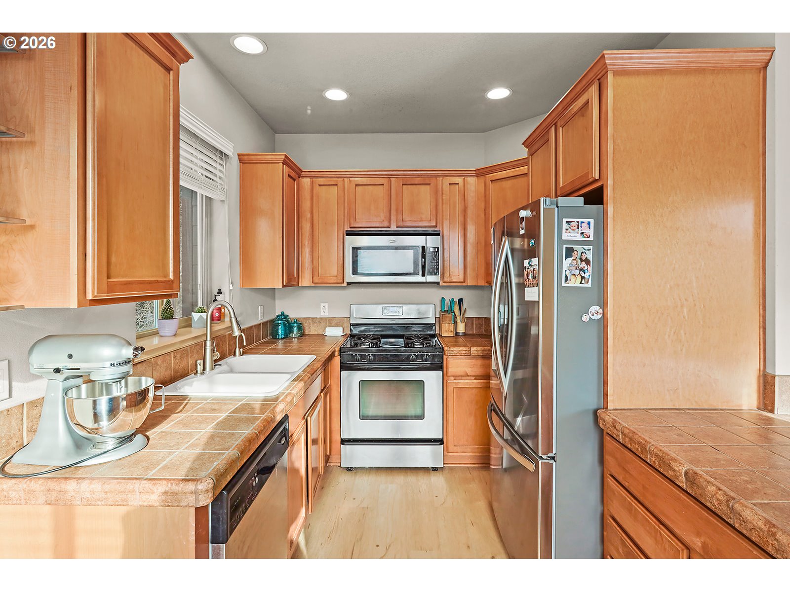 41 Lasher Street, Unit C4 Stevenson, WA 98648 - Photo 16 of 48 a kitchen with stainless steel appliances granite countertop a sink stove and refrigerator