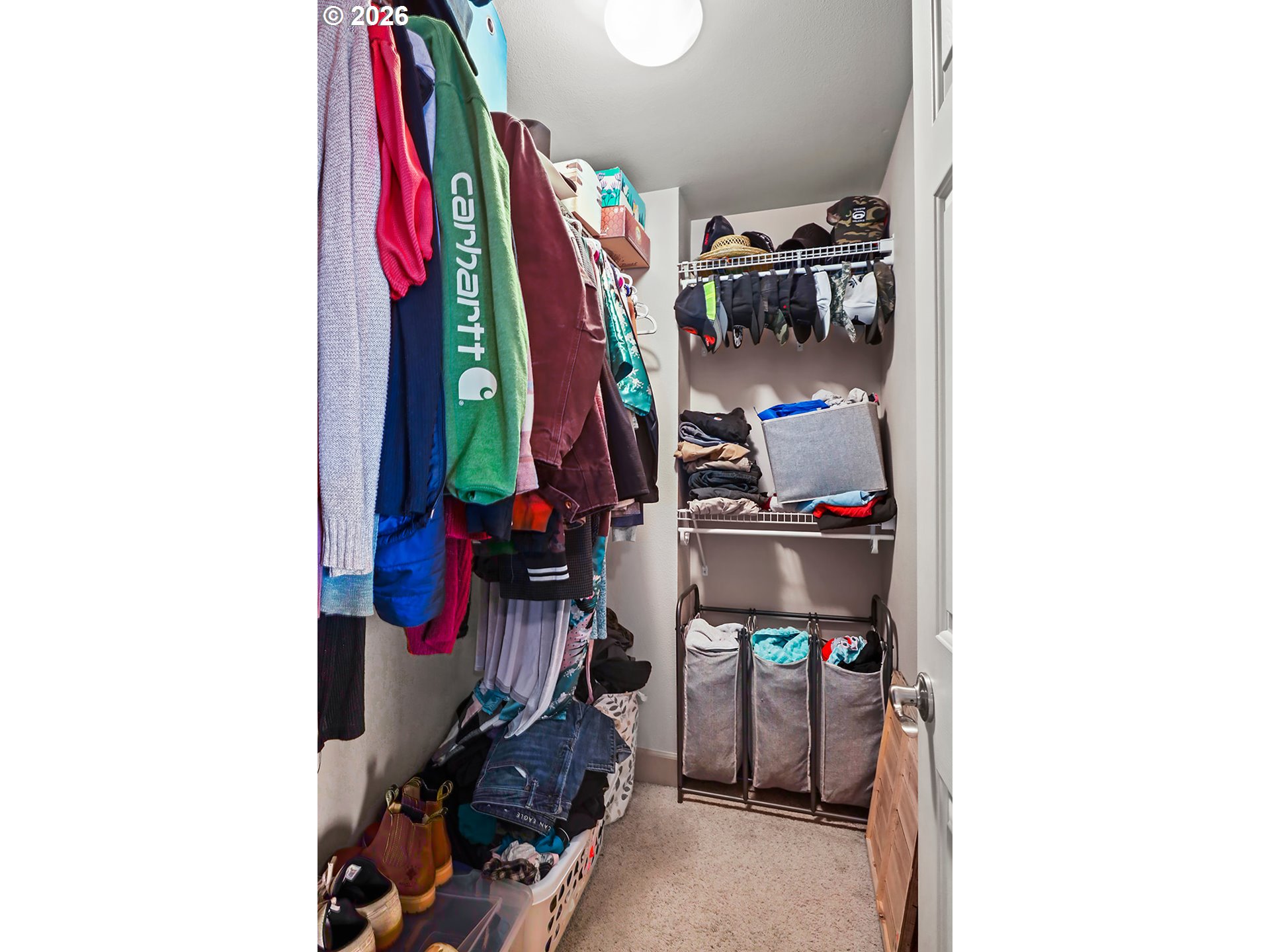 41 Lasher Street, Unit C4 Stevenson, WA 98648 - Photo 32 of 48 a view of walk in closet with clothes and shoes