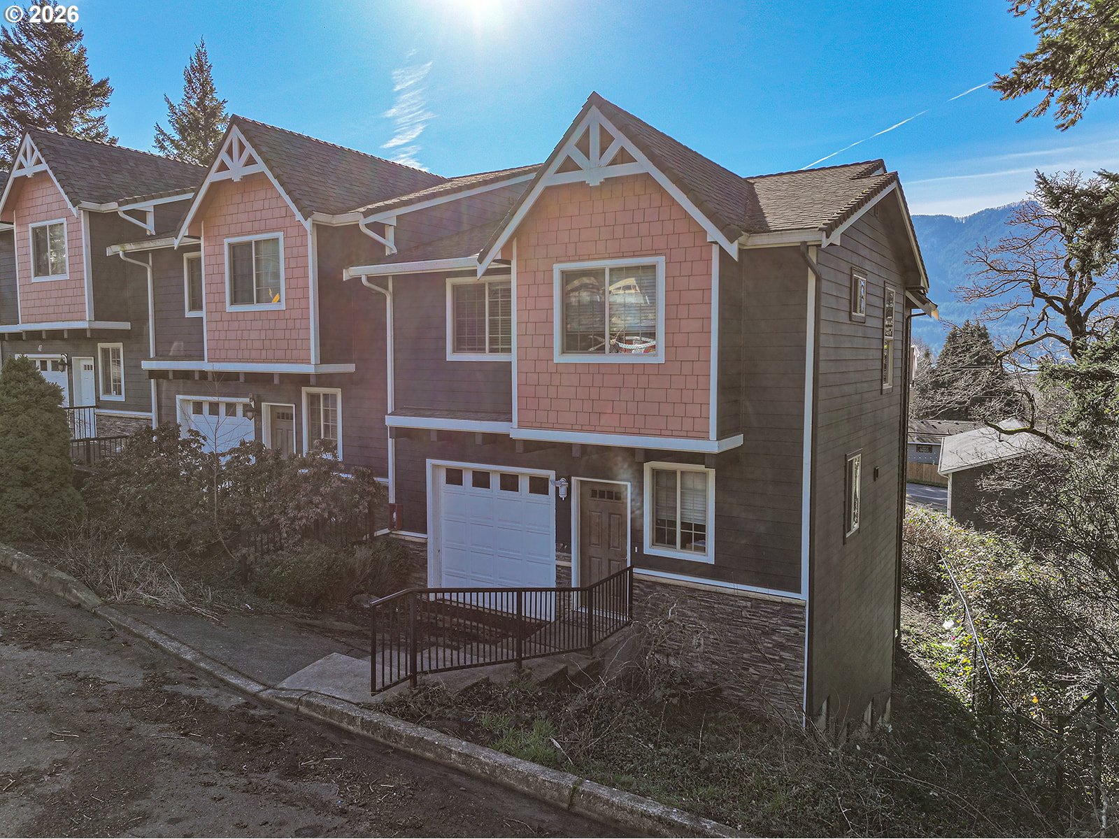 41 Lasher Street, Unit C4 Stevenson, WA 98648 - Photo 4 of 48 a front view of a house with a yard and garage