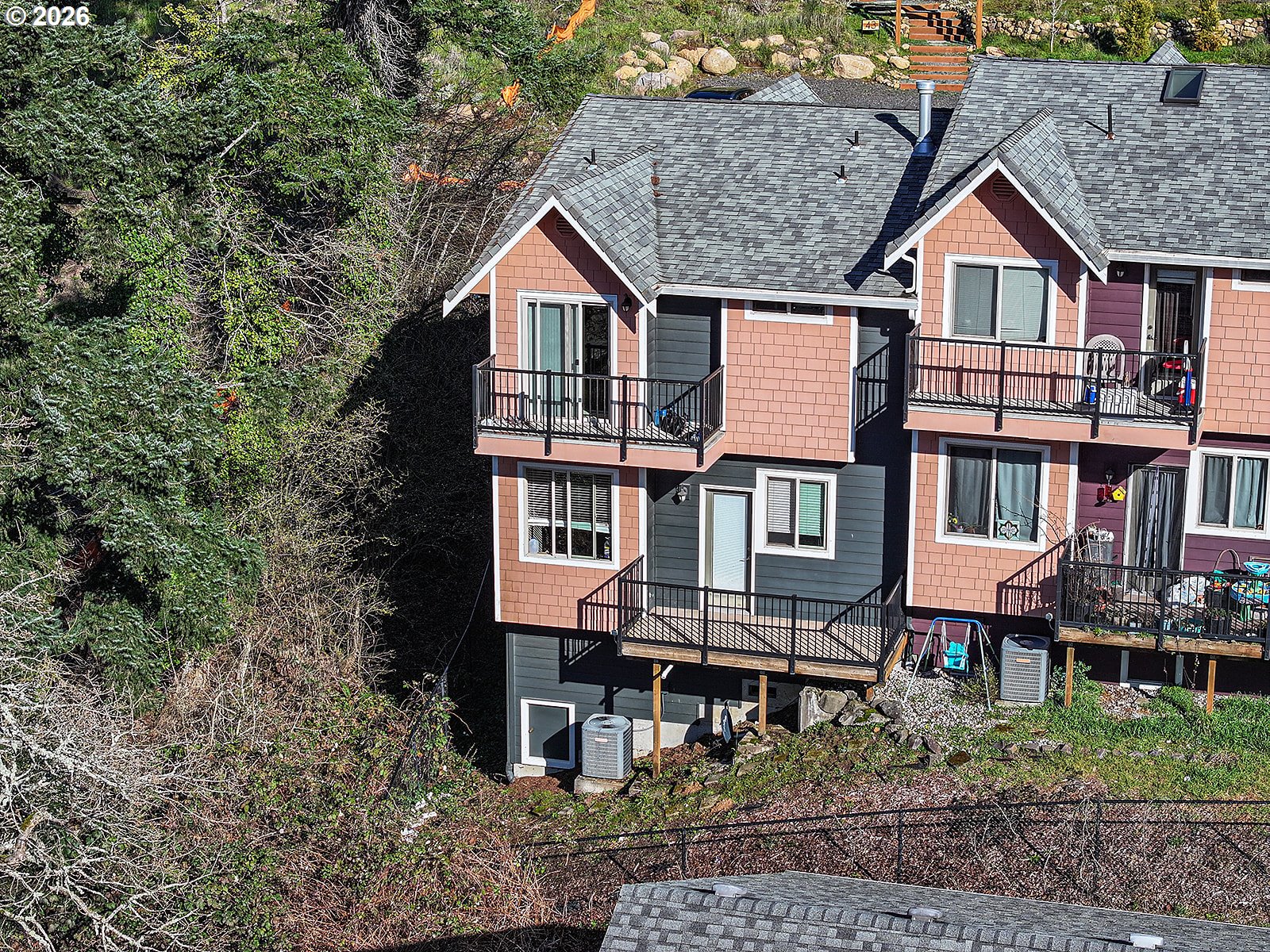 41 Lasher Street, Unit C4 Stevenson, WA 98648 - Photo 5 of 48 a front view of a house with a yard and trees