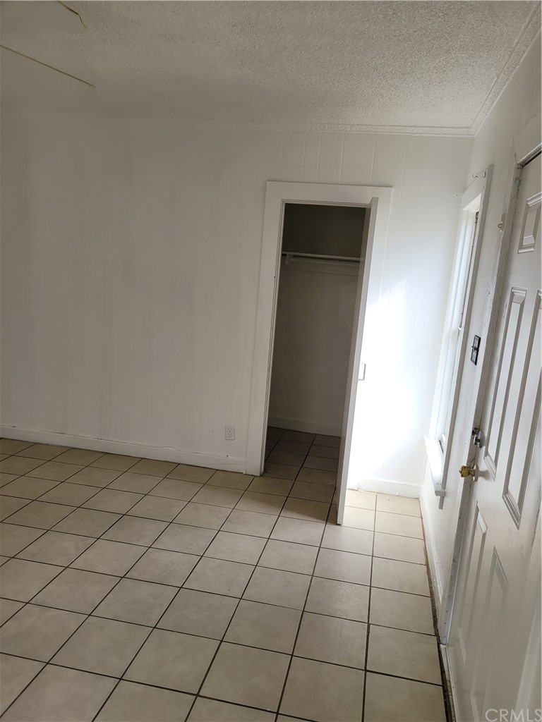 3077 Lemon Street Riverside, CA 92501 - Photo 9 of 20 a view of an empty room and a bathroom