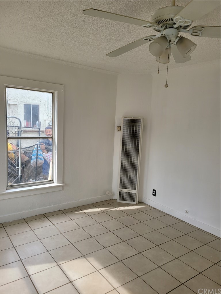 3077 Lemon Street Riverside, CA 92501 - Photo 10 of 20 a view of an empty room and window