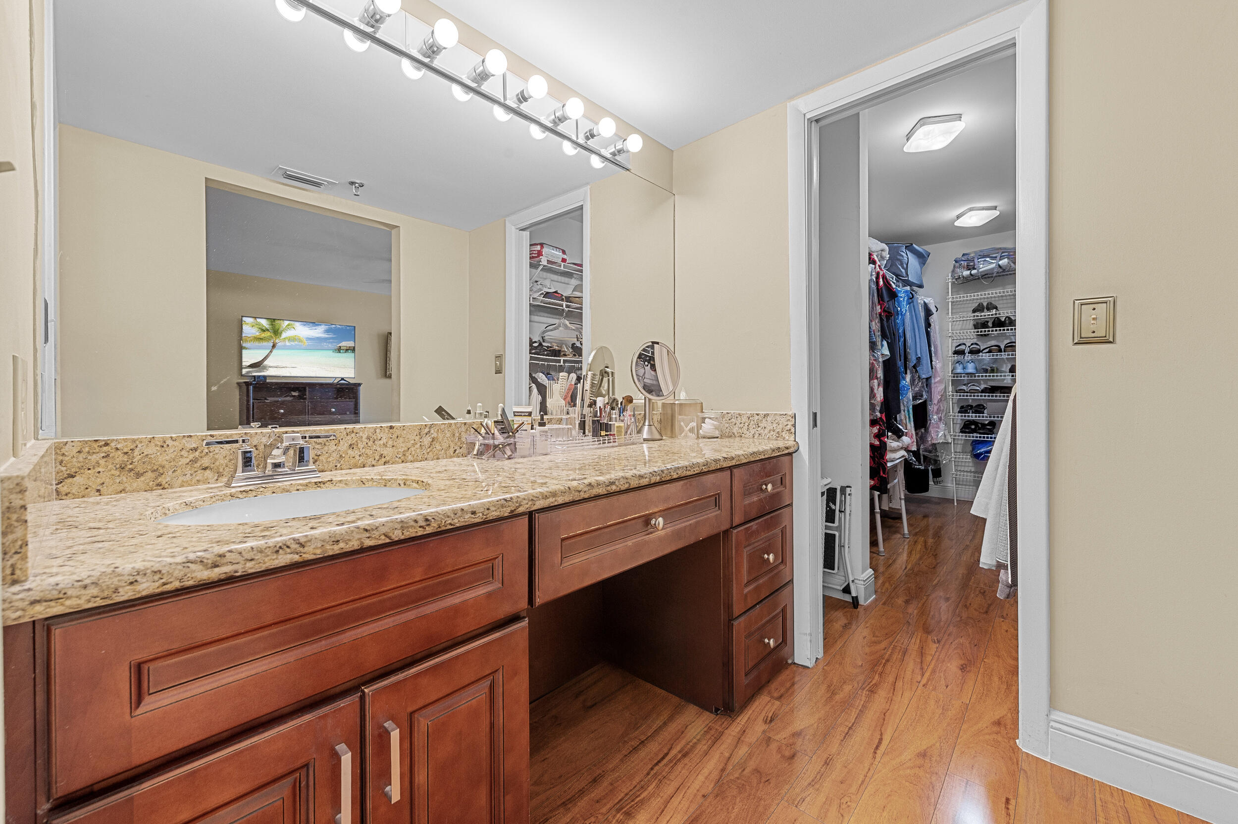 7209 Promenade Drive, Unit 201 Boca Raton, FL 33433 - Photo 26 of 41 a bathroom with a granite countertop double vanity sink and a mirror