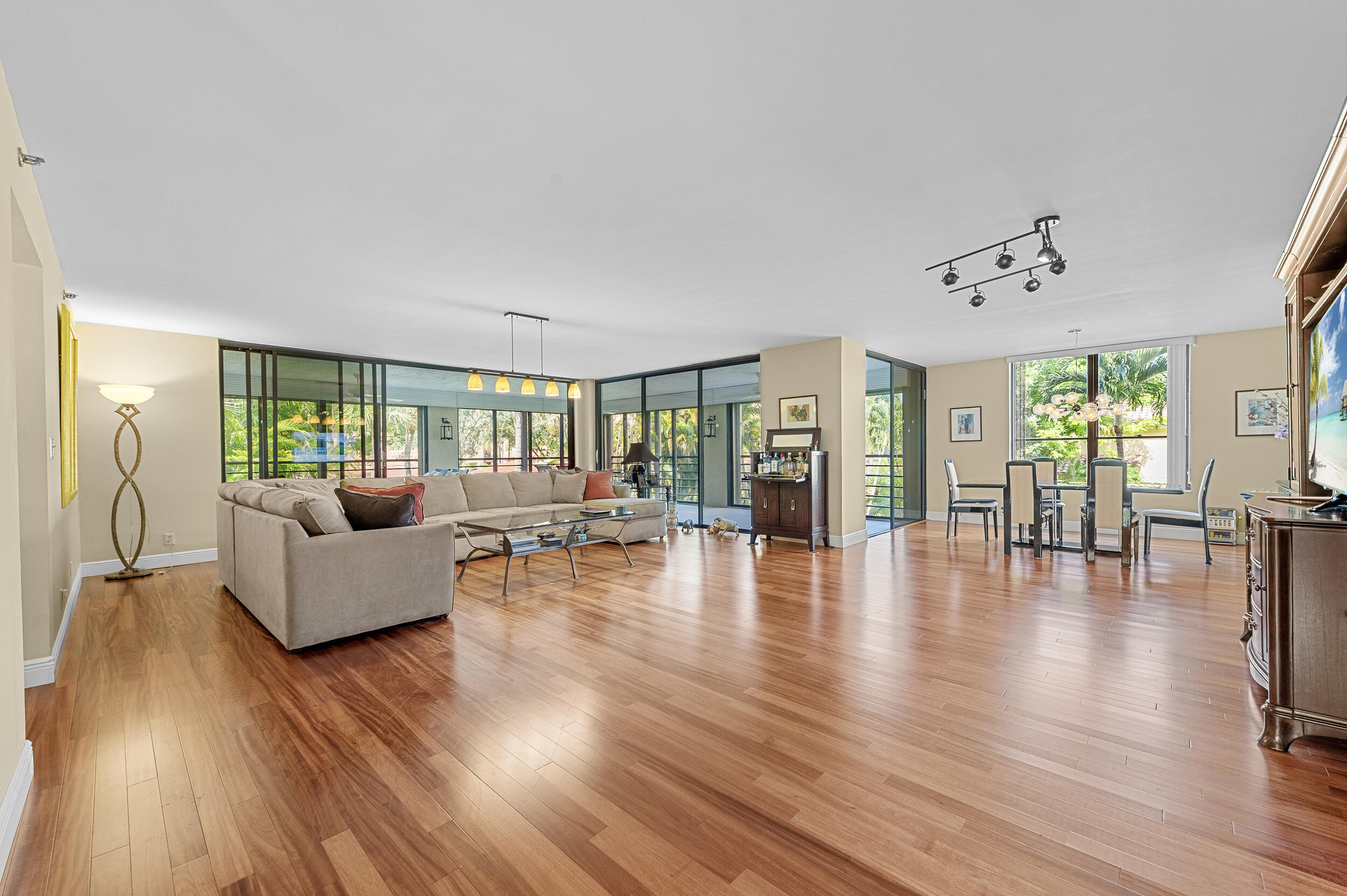 7209 Promenade Drive, Unit 201 Boca Raton, FL 33433 - Photo 5 of 41 a living room with furniture and wooden floor