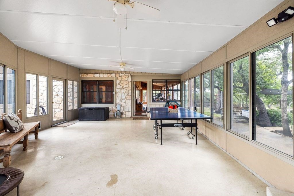 257 Encino Loop Kerrville, TX 78028 - Photo 27 of 92 a view of a livingroom with furniture window and outside view