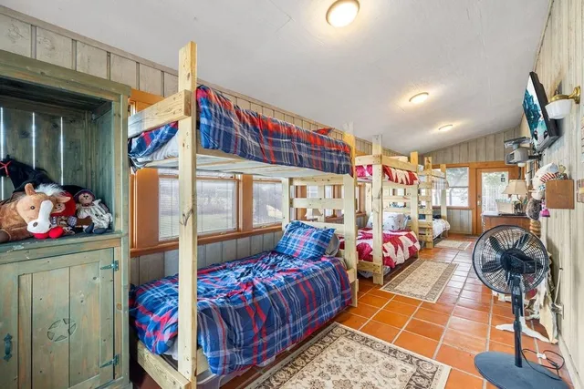 a view of a park with large trees