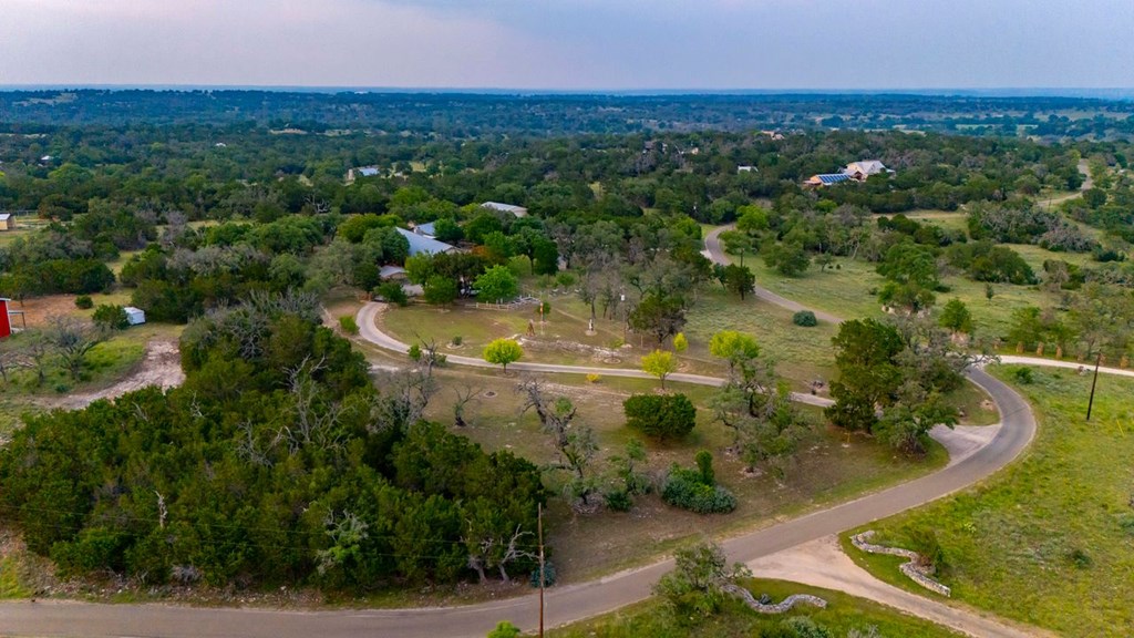 257 Encino Loop Kerrville, TX 78028 - Photo 68 of 92 an aerial view of residential houses with outdoor space and trees