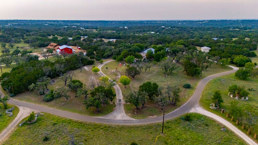 257 Encino Loop Kerrville, TX 78028 - Photo 73 of 92 an aerial view of residential houses with outdoor space and trees