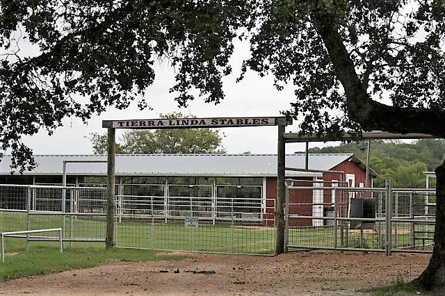 257 Encino Loop Kerrville, TX 78028 - Photo 82 of 92 a view of a house with a yard and a large tree