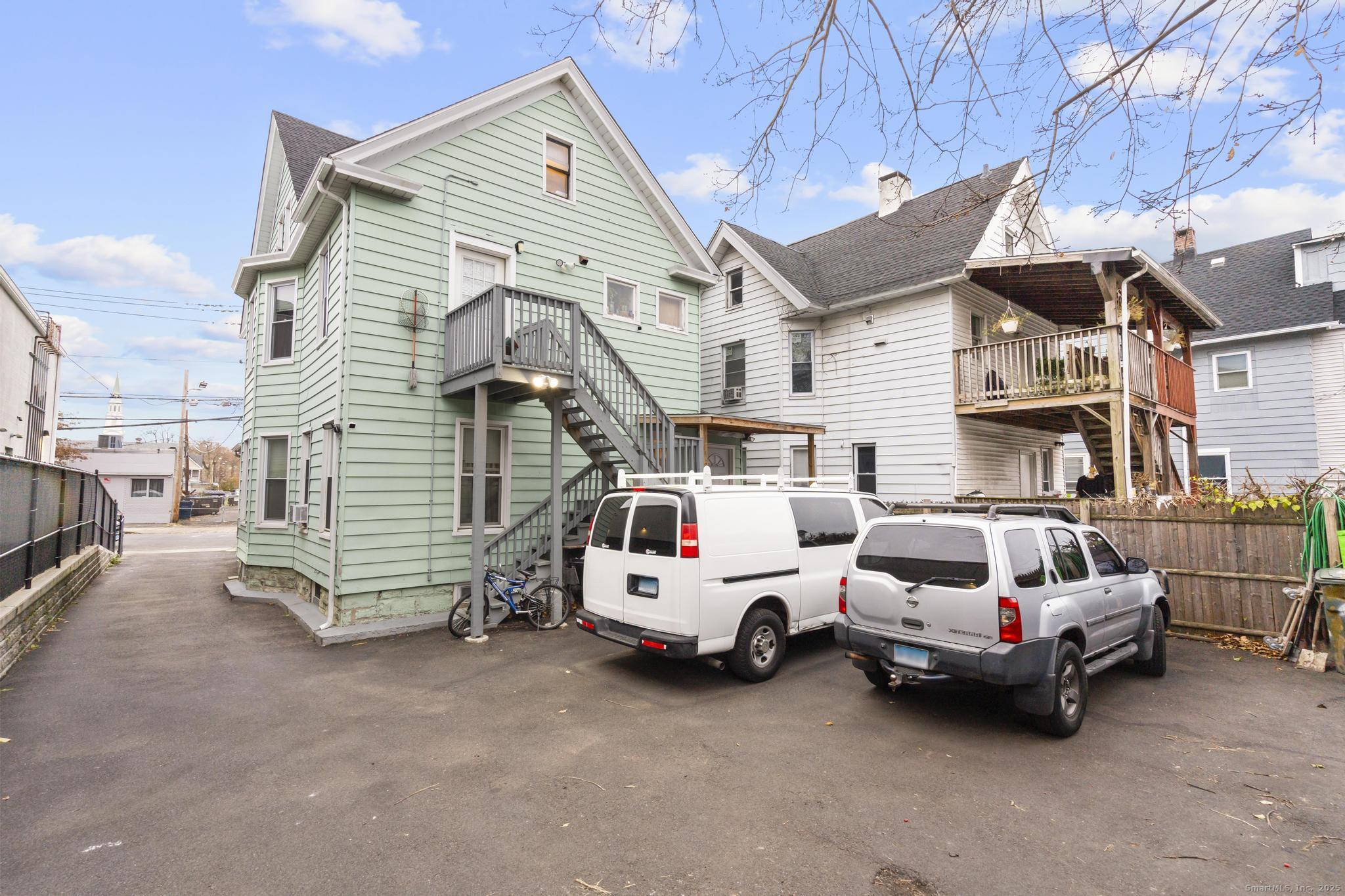 865 Iranistan Avenue Bridgeport, CT 06605 - Photo 2 of 35 a view of a cars park in front of a building