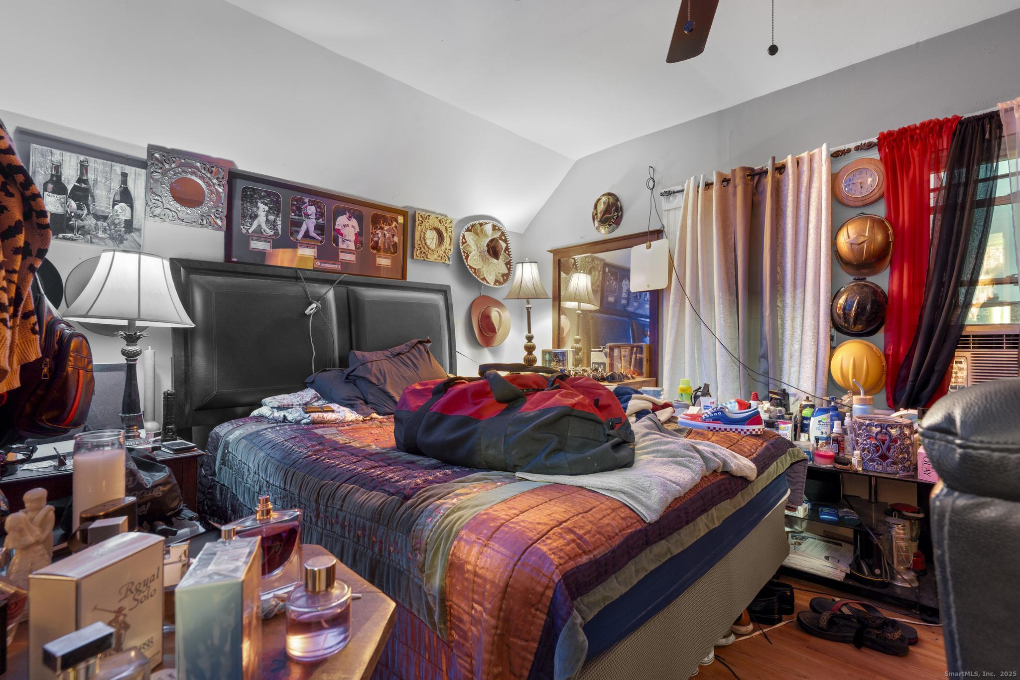 865 Iranistan Avenue Bridgeport, CT 06605 - Photo 32 of 35 a bedroom with furniture and a lamp