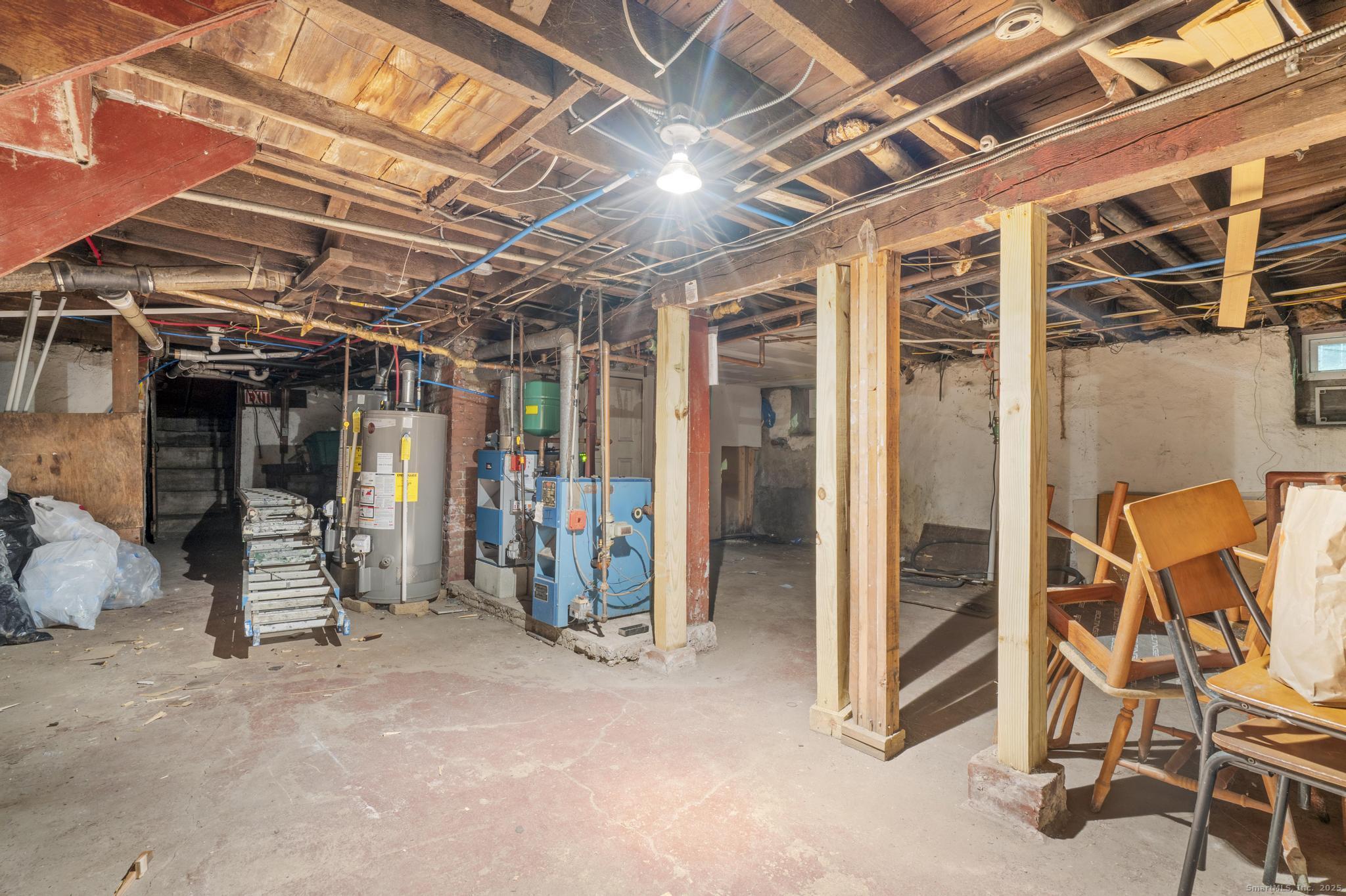 865 Iranistan Avenue Bridgeport, CT 06605 - Photo 35 of 35 a view of a room with wooden chairs