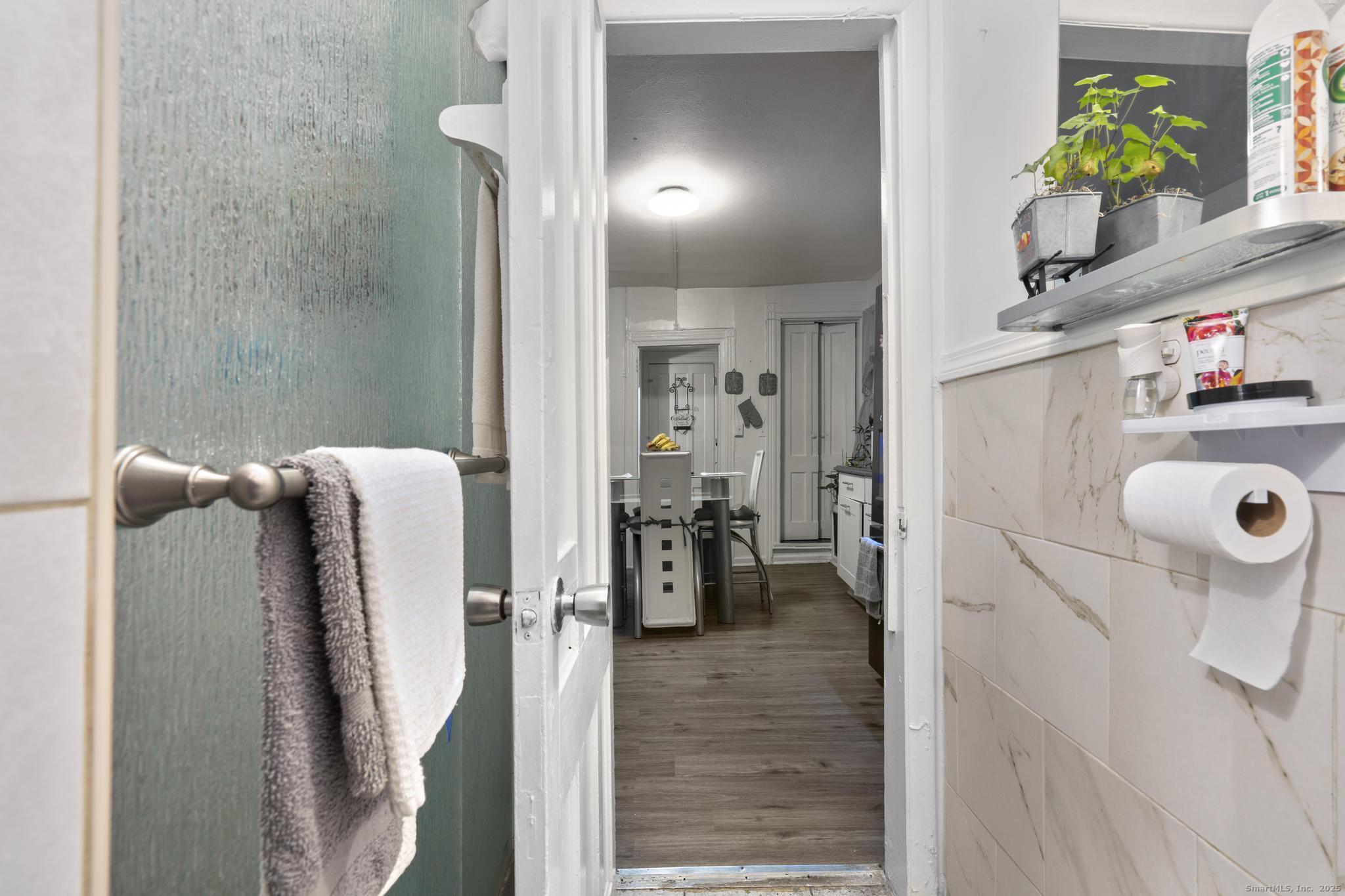 865 Iranistan Avenue Bridgeport, CT 06605 - Photo 6 of 35 a bathroom with a sink and mirror