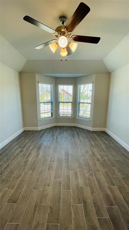 2131 Erika Lane Forney, TX 75126 - Photo 5 of 20 a view of an empty room with wooden floor and a window