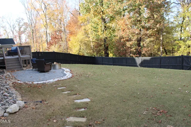 a front view of house with outdoor seating