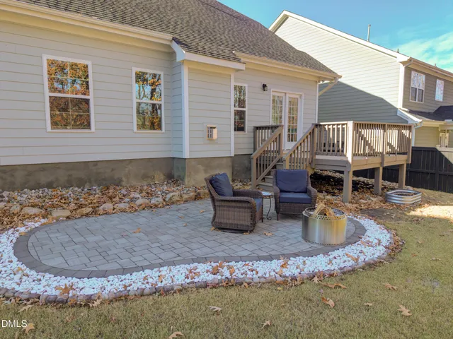 a view of a chairs and table on the wooden floor