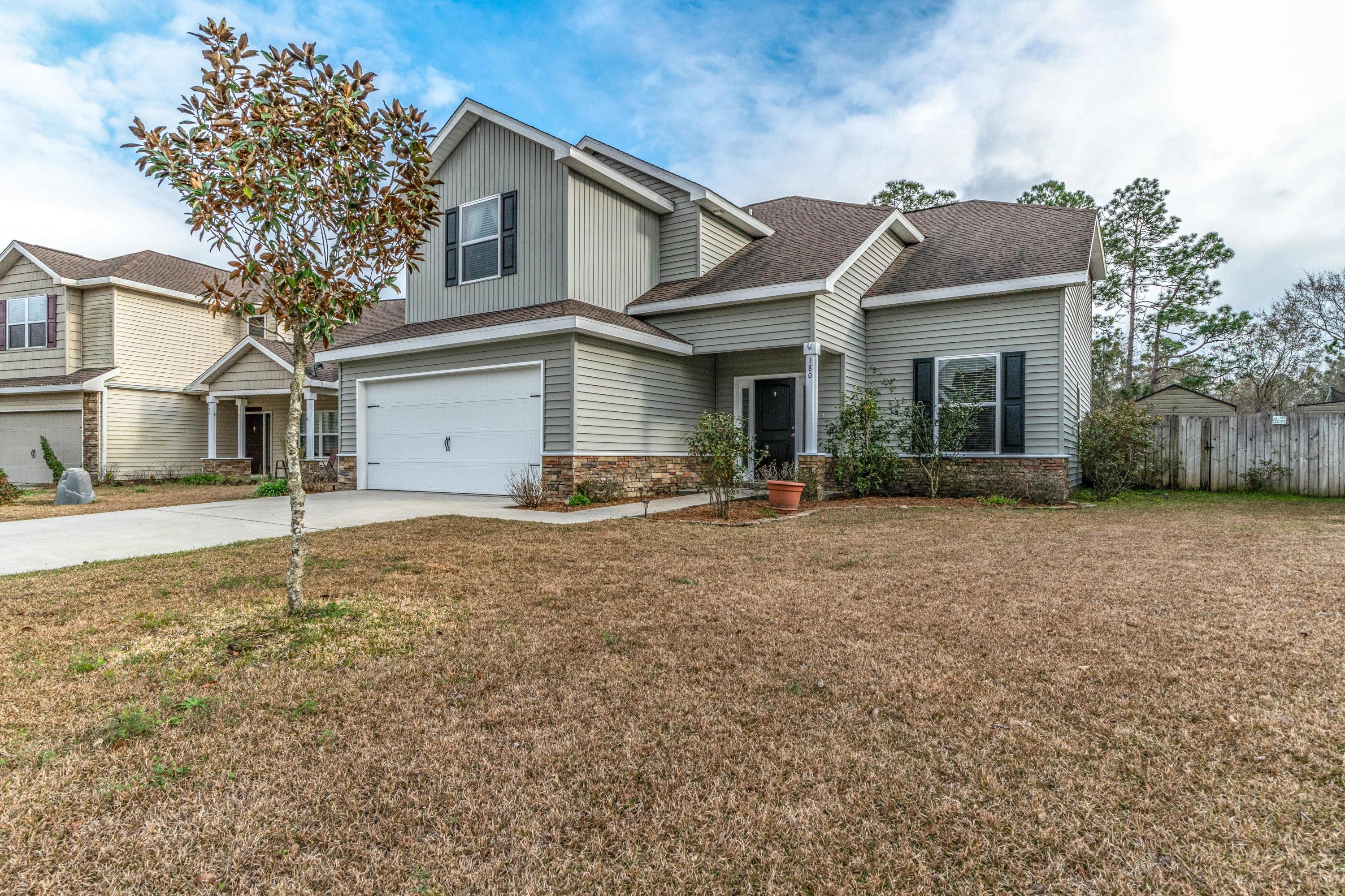 180 Peoria Boulevard Crestview, FL 32536 - Photo 1 of 33 a front view of house with yard