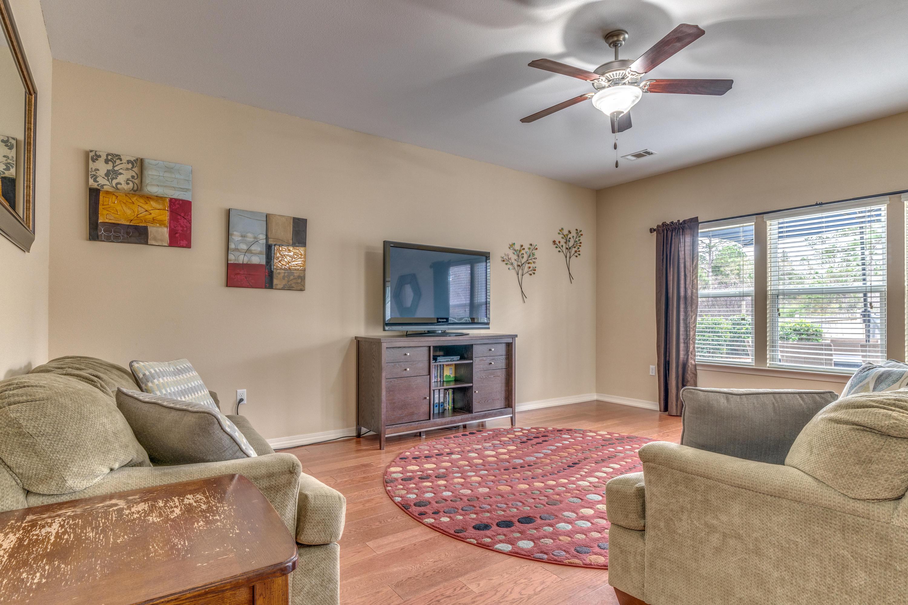 180 Peoria Boulevard Crestview, FL 32536 - Photo 12 of 33 a living room with furniture and a flat screen tv