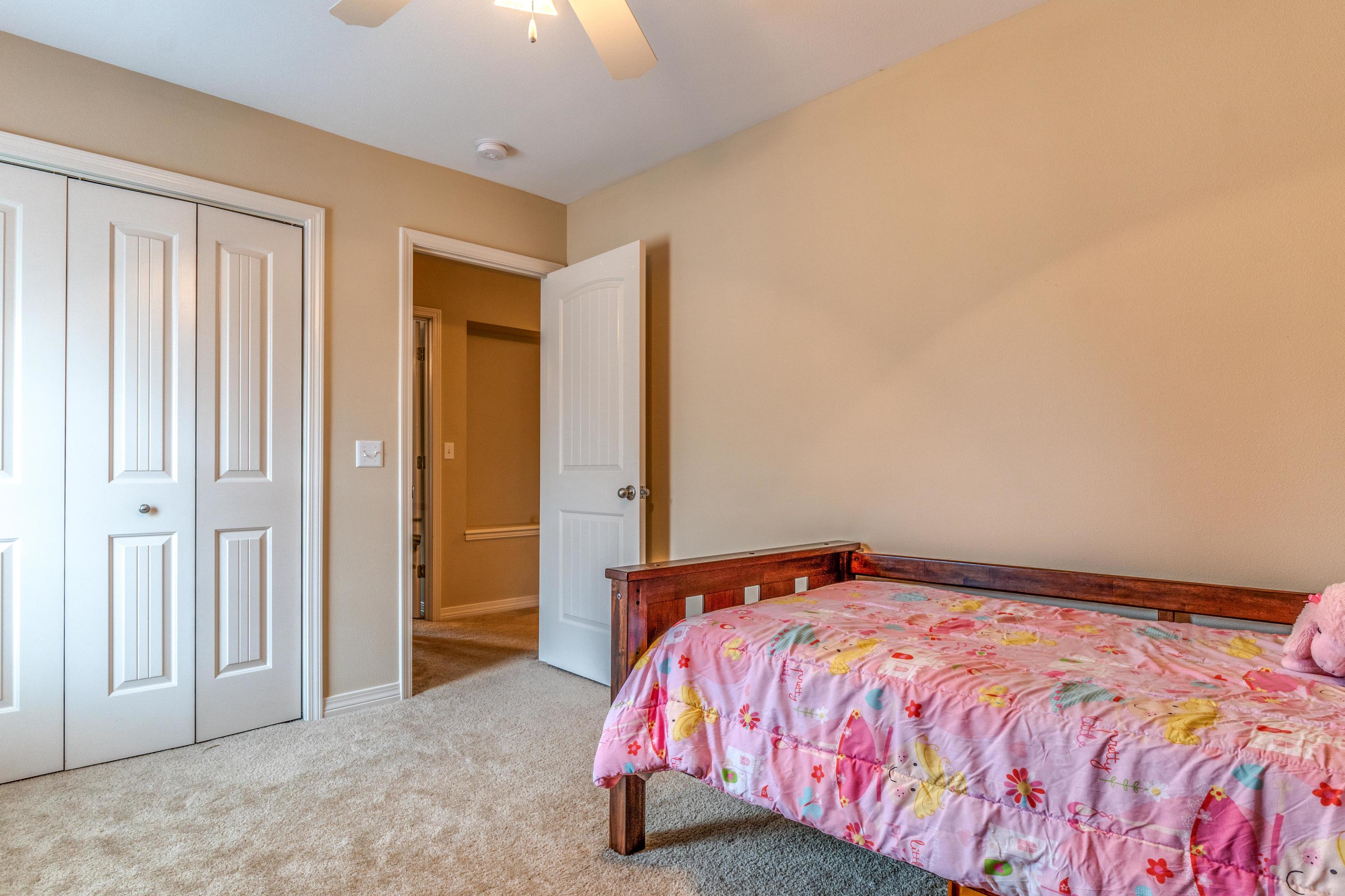 180 Peoria Boulevard Crestview, FL 32536 - Photo 24 of 33 a bedroom with a bed and a window