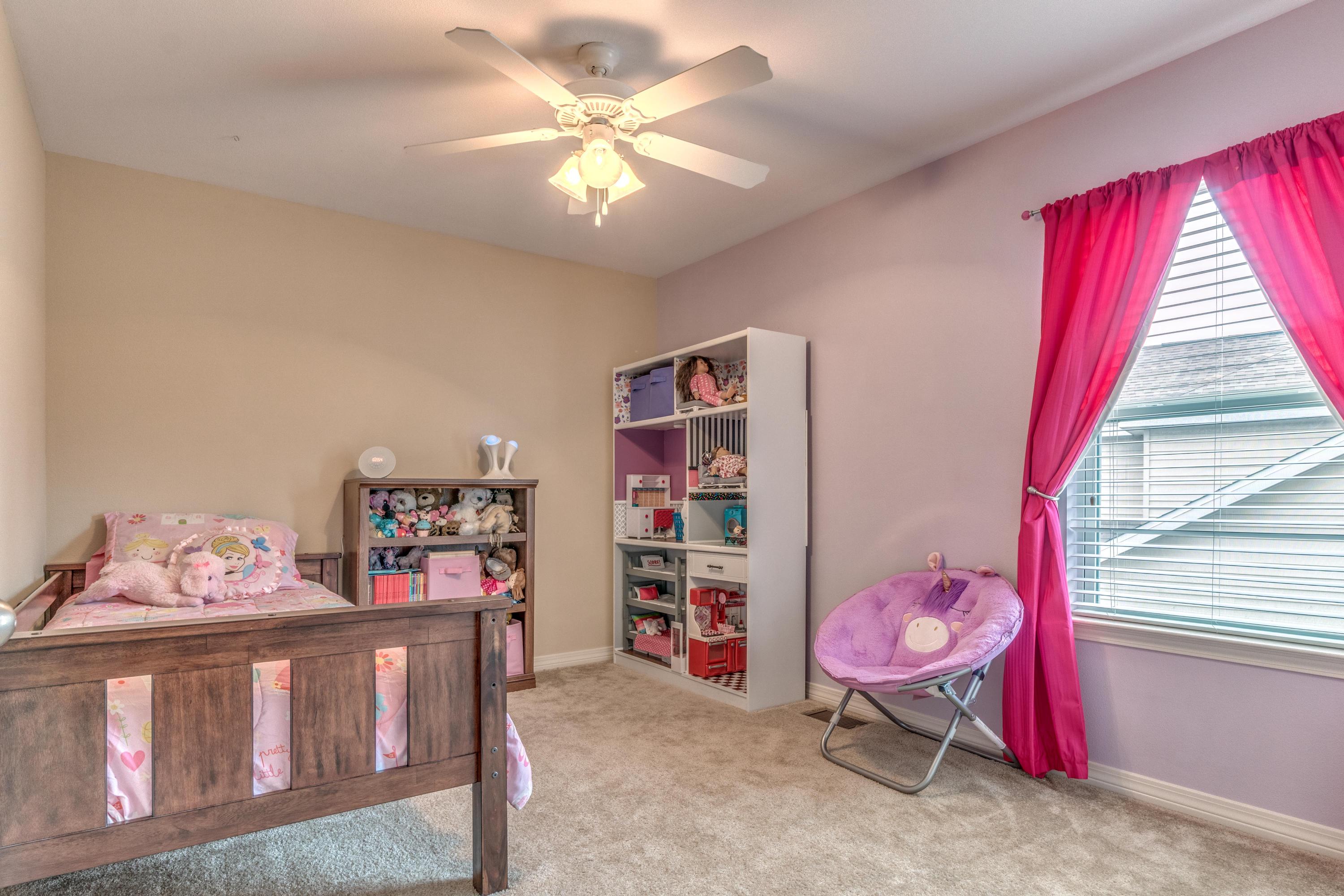 180 Peoria Boulevard Crestview, FL 32536 - Photo 25 of 33 a bedroom with furniture and a window