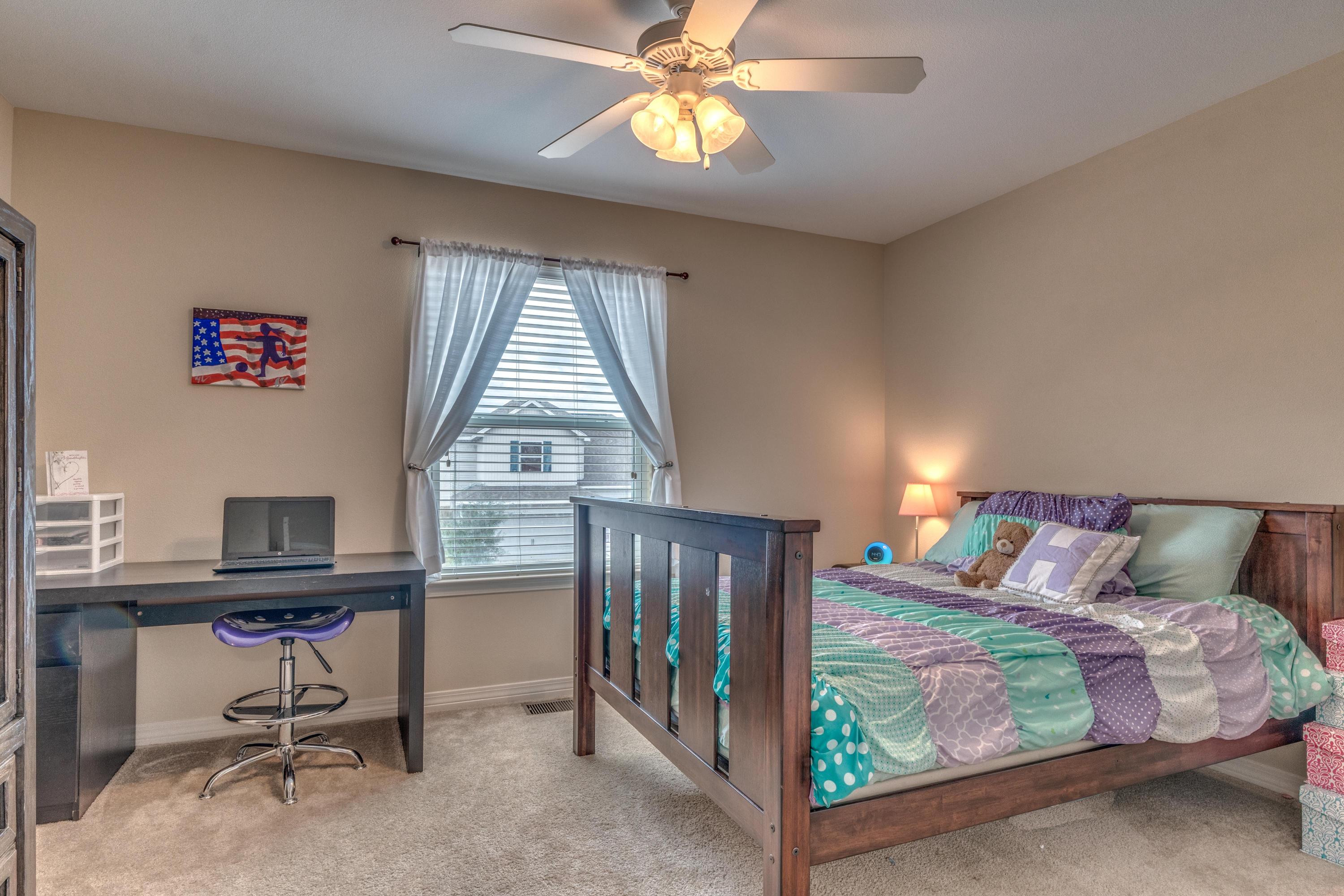 180 Peoria Boulevard Crestview, FL 32536 - Photo 27 of 33 a bedroom with a bed and a window