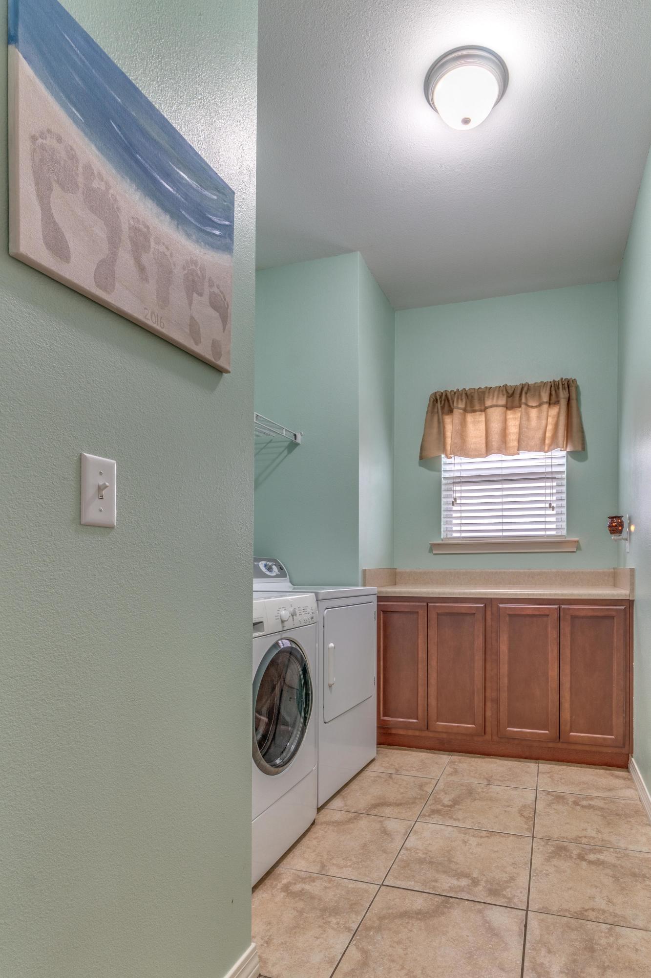 180 Peoria Boulevard Crestview, FL 32536 - Photo 29 of 33 a view of a storage & utility room with a washer dryer