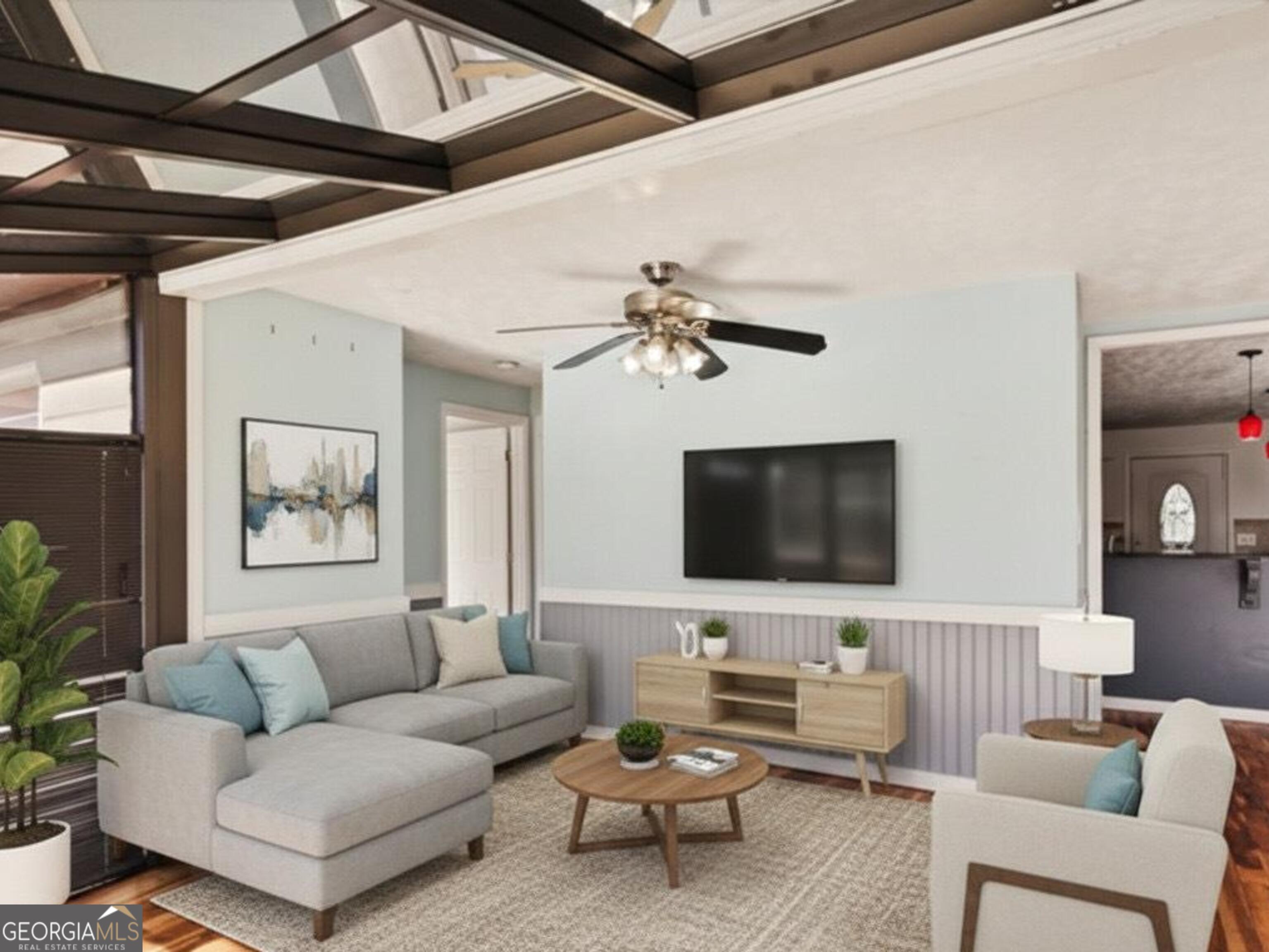 70 Birch Road Covington, GA 30014 - Photo 18 of 23 a living room with furniture and a flat screen tv