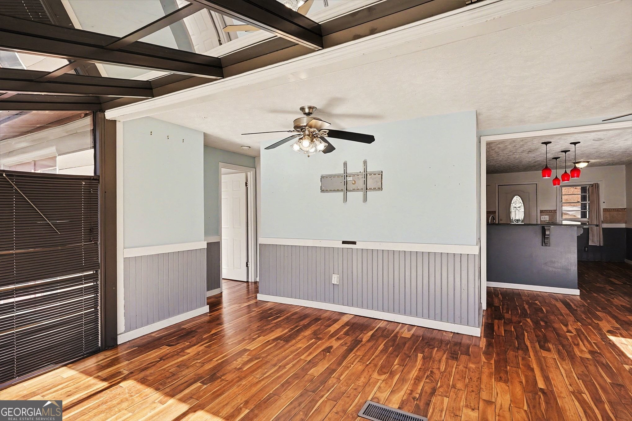 70 Birch Road Covington, GA 30014 - Photo 19 of 23 a view of a hallway with wooden floor and staircase