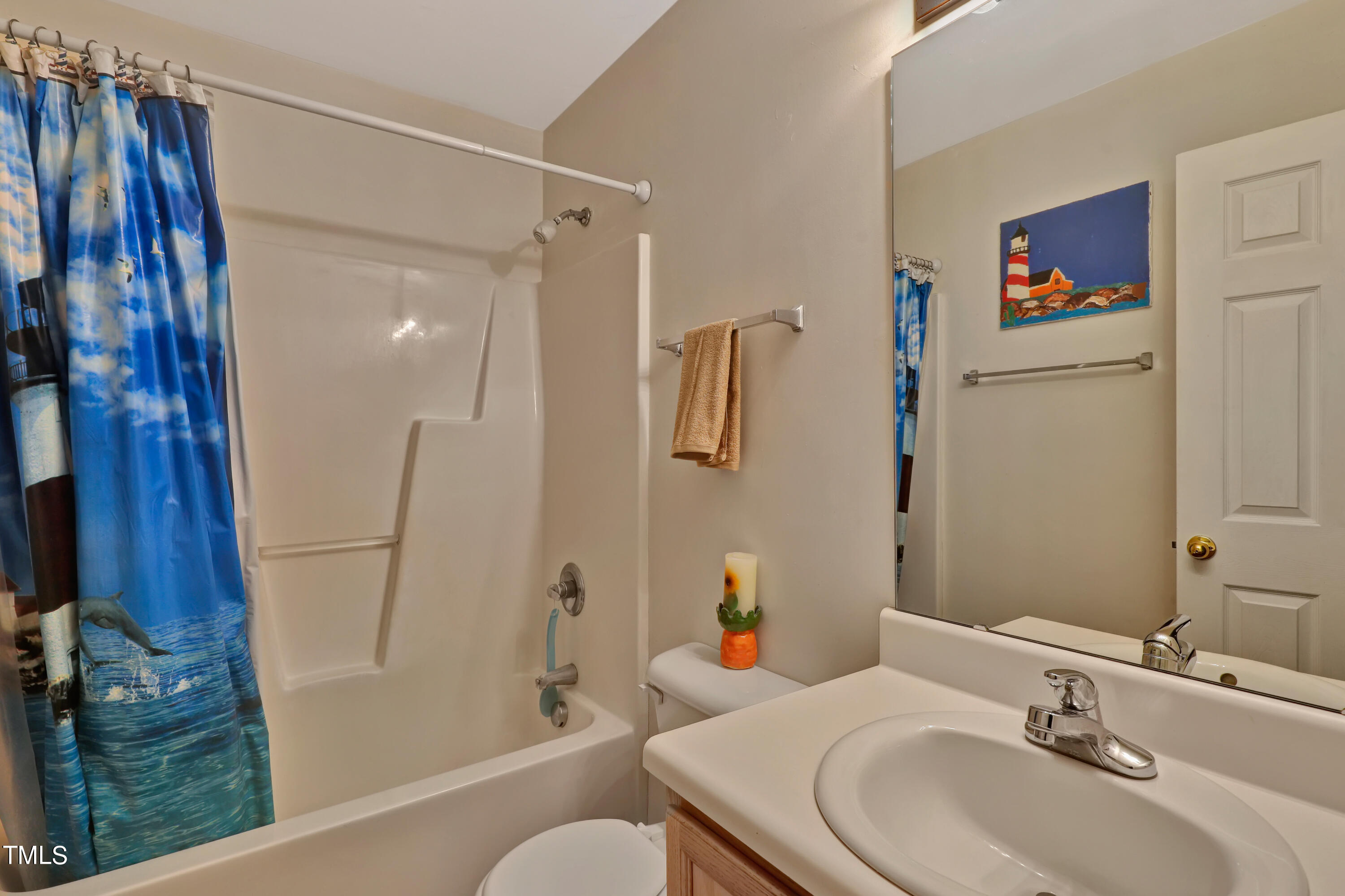 603 East Martin Street Raleigh, NC 27601 - Photo 20 of 25 a bathroom with a sink toilet and shower
