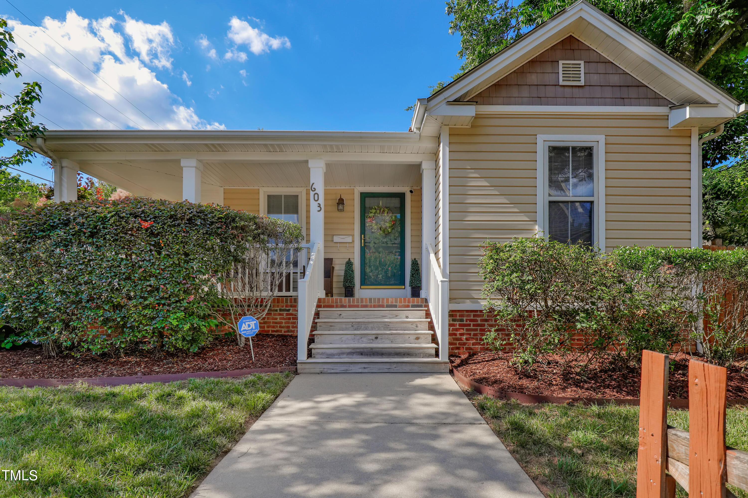 603 East Martin Street Raleigh, NC 27601 - Photo 2 of 25 a front view of a house with a yard