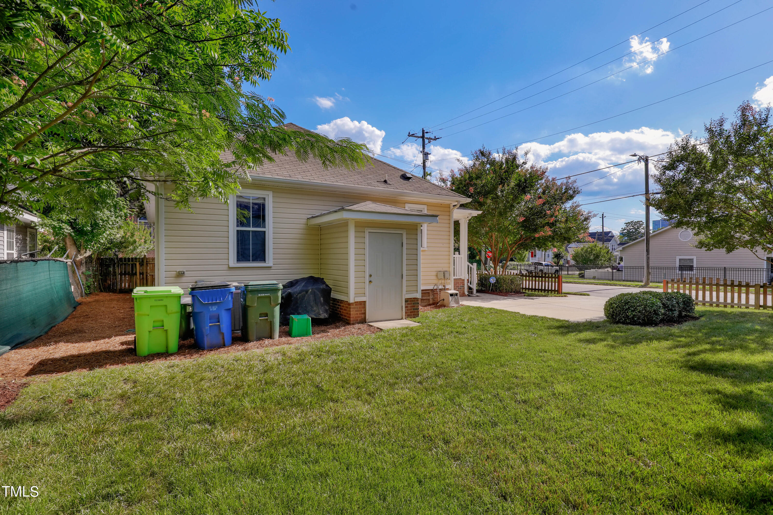 603 East Martin Street Raleigh, NC 27601 - Photo 24 of 25 a view of a backyard with a garden and plants