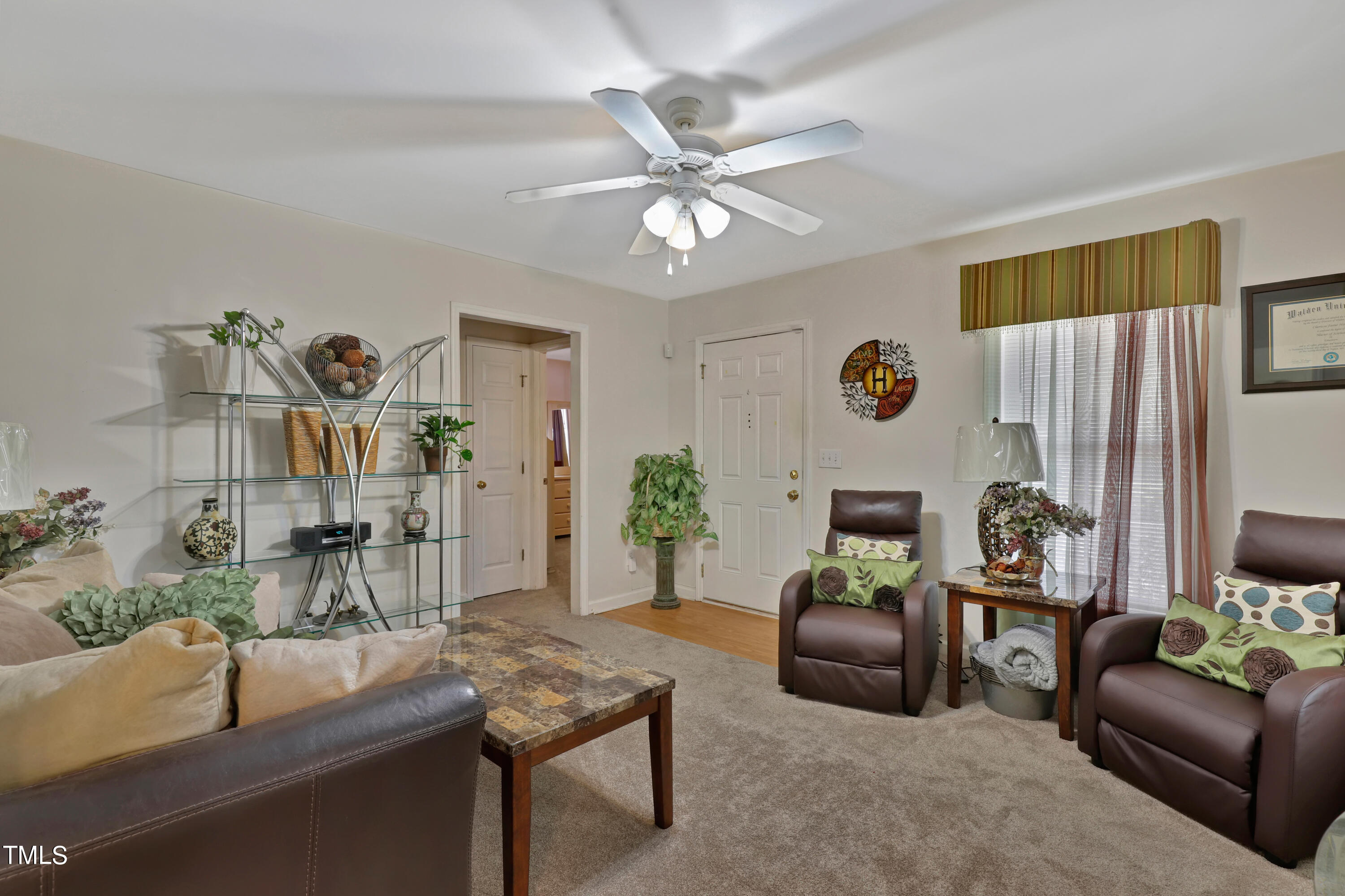 603 East Martin Street Raleigh, NC 27601 - Photo 5 of 25 a living room with furniture and a table