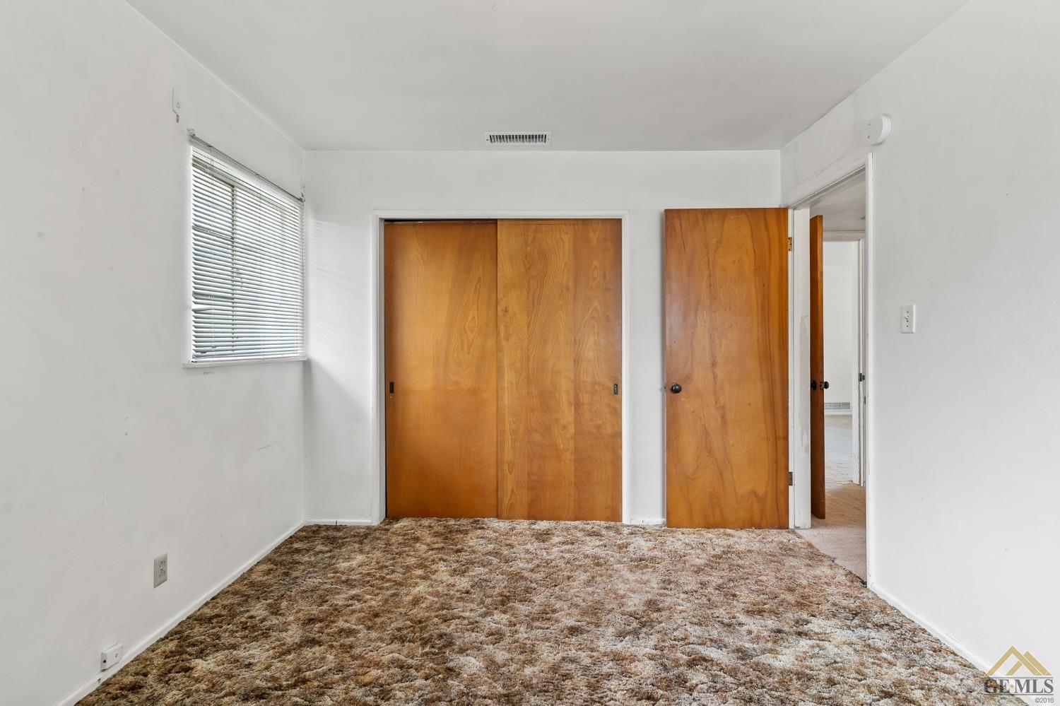 Undisclosed Address Wasco, CA 93280 - Photo 19 of 30 a view of a room with window and carpet