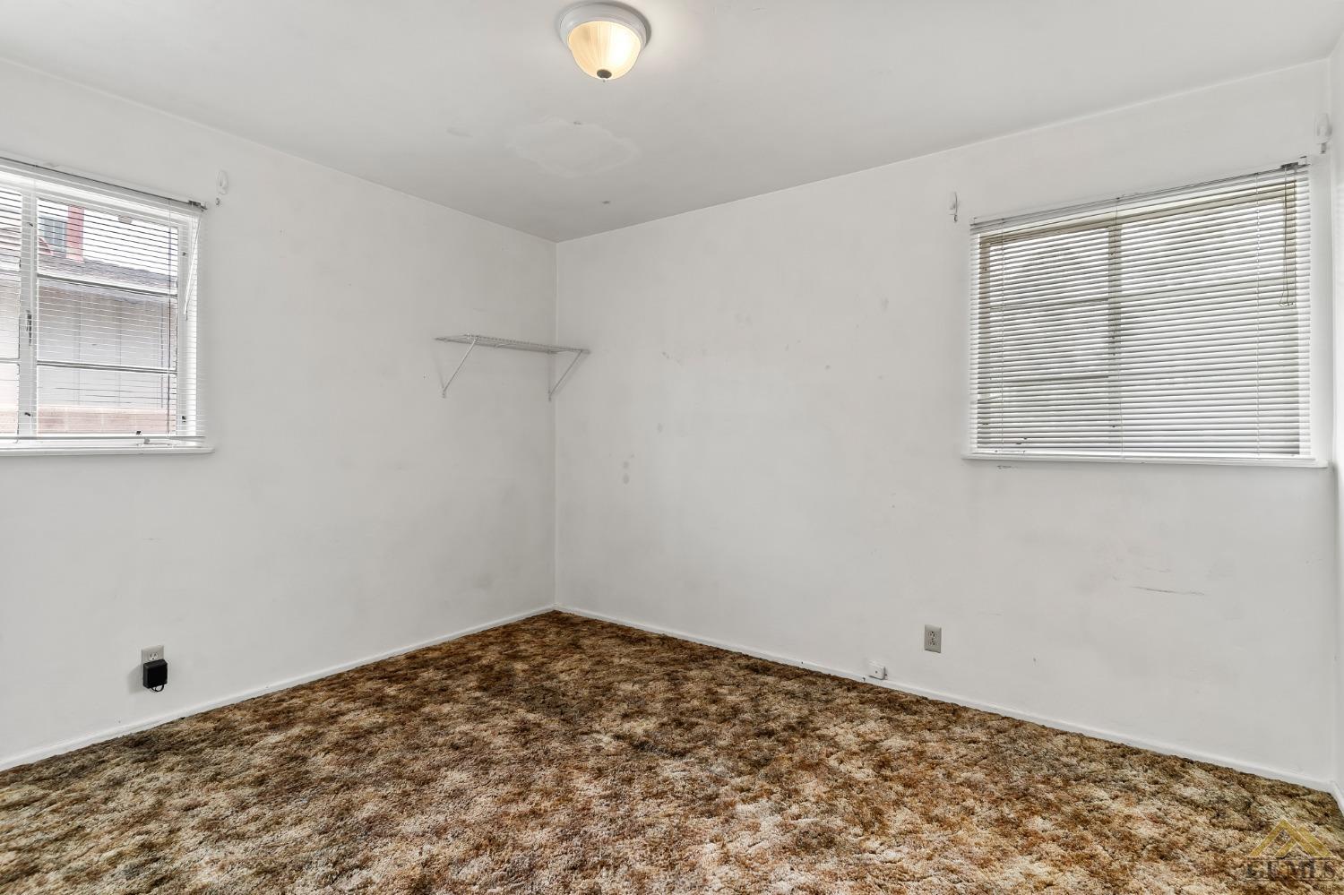Undisclosed Address Wasco, CA 93280 - Photo 20 of 30 a view of a room with window and cabinet